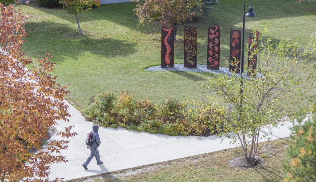 student walking on campus