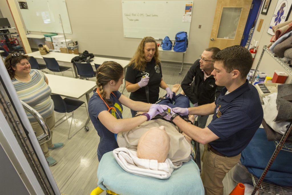 EMS students working on a dummy
