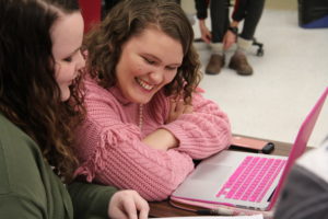 two students working on a paper programs of study